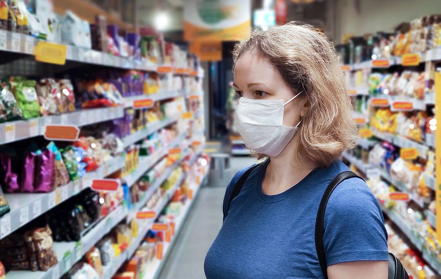 Pandemia: Coronavirus And Retail Concept, Young Woman Wearing Medical Mask